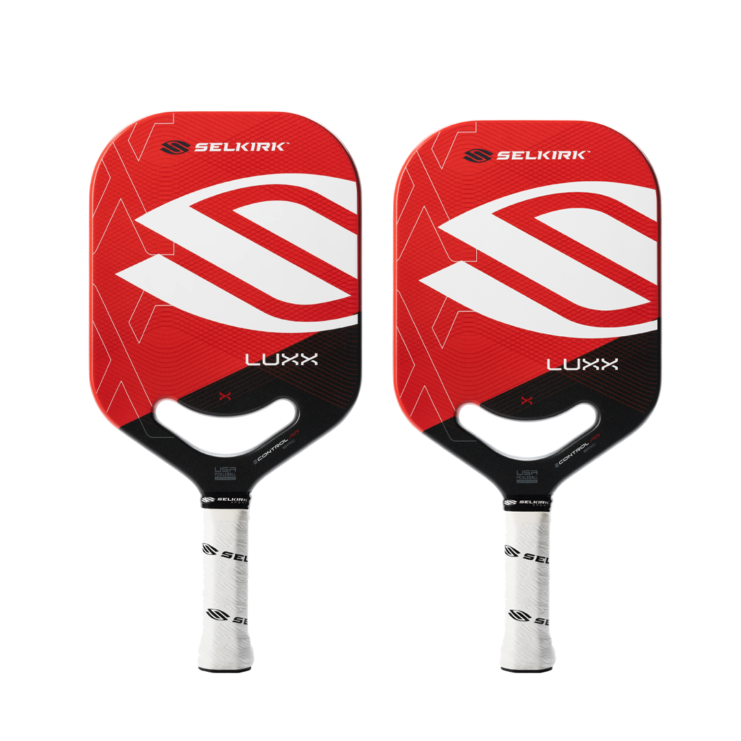 Selkirk Amped Pro Air Epic and Invikta pickleball paddles, with blue designs and labeled as Epic (left) and Invikta (right).